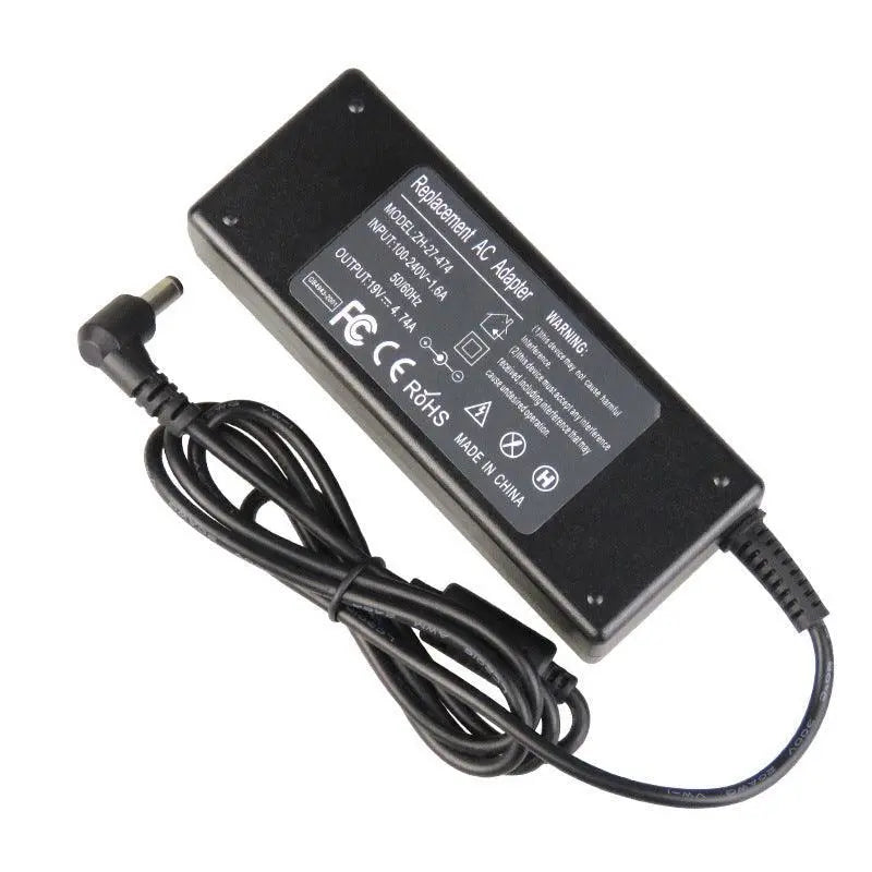 Multi-function notebook power adapter with universal compatibility, adjustable voltage settings, and multiple connectors for versatile laptop charging.